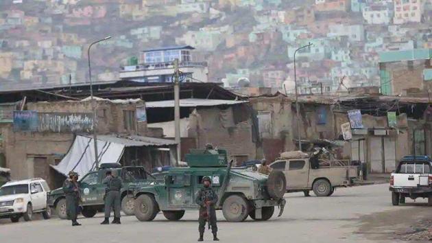 Afghan police after gunmen stormed a religious gathering of Afghanistan’s minority Sikhs in their place of worship in the heart of the Afghan capital’s old city on Wednesday.(AP) Afghan police after gunmen stormed a religious gathering of Afghanistan’s minority Sikhs in their place of worship in the heart of the Afghan capital’s old city on Wednesday.(AP)