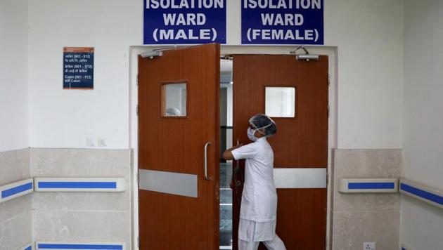 A paramedic staff member enters a newly setup isolation ward for the people who suffer symptoms of coronavirus disease (COVID-19), at a hospital in Kolkata. (REUTERS) A paramedic staff member enters a newly setup isolation ward for the people who suffer symptoms of coronavirus disease (COVID-19), at a hospital in Kolkata. (REUTERS)