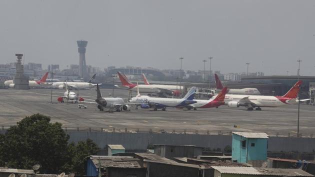 Aircrafts are seen parked on a runway at the Chhatrapati Shivaji domestic airport in Mumbai.(AP)