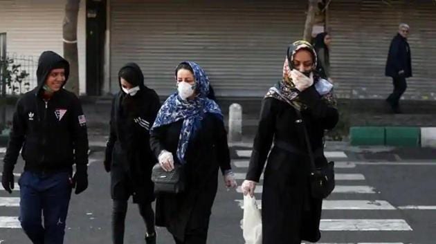 Iranian people wear protective masks to prevent contracting a coronavirus, in Tehran, Iran(Reuters File Photo)