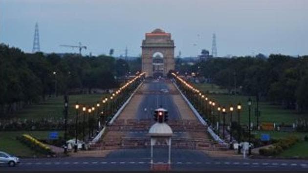 Heavy clouds hover over a deserted Rajpath in New Delhi. The stretch lies empty due to the nationwide lockdown as a precautionary measure against the coronavirus. (SANCHIT KHANNA/ HT Photo) 