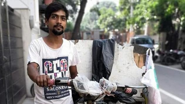 A waste collector in Delhi says from the news, he knows that the coronavirus came from those who are rich enough to travel to foreign countries. (HT Photo) A waste collector in Delhi says from the news, he knows that the coronavirus came from those who are rich enough to travel to foreign countries. (HT Photo)