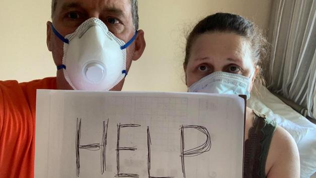 Canadian passengers Chris & Anna Joiner ask for help onboard the MS Zaandam, Holland America Line cruise ship, during the coronavirus outbreak, off the shores of Panama City, Panama March 27, 2020. (Reuters file photo) Canadian passengers Chris & Anna Joiner ask for help onboard the MS Zaandam, Holland America Line cruise ship, during the coronavirus outbreak, off the shores of Panama City, Panama March 27, 2020. (Reuters file photo)