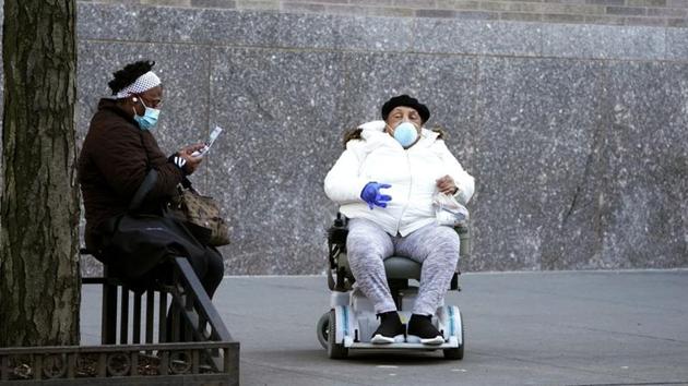 People sit outside a hospital during the outbreak of coronavirus disease (COVID-19), in the Manhattan borough of New York City, New York, U.S., March 27, 2020. The United States has overtaken China and Italy as the country with the most coronavirus infections. (Carlo Allegri / REUTERS) People sit outside a hospital during the outbreak of coronavirus disease (COVID-19), in the Manhattan borough of New York City, New York, U.S., March 27, 2020. The United States has overtaken China and Italy as the country with the most coronavirus infections. (Carlo Allegri / REUTERS)