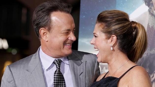 Actor Tom Hanks poses with wife, actress Rita Wilson, at a movie premiere.(REUTERS)