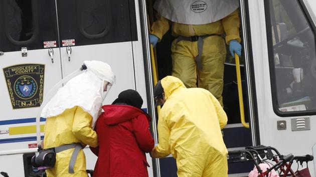 Medical officials aid a residents from St. Joseph’s nursing home to board a bus, after a number of residents tested positive for COVID-19 in Woodbridge, New Jersey. Dr. Alexander Salerno of Salerno Medical Associates, a general medical practice, described to Reuters going through a “broker” to pay $17,000 for masks and other protective equipment that should have cost about $2,500, and picking them up at an abandoned warehouse. (Stefan Jeremiah / REUTERS) Medical officials aid a residents from St. Joseph’s nursing home to board a bus, after a number of residents tested positive for COVID-19 in Woodbridge, New Jersey. Dr. Alexander Salerno of Salerno Medical Associates, a general medical practice, described to Reuters going through a “broker” to pay $17,000 for masks and other protective equipment that should have cost about $2,500, and picking them up at an abandoned warehouse. (Stefan Jeremiah / REUTERS)