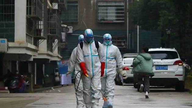 Volunteer officers who hold other jobs have joined frontline policing to help deal with the coronavirus pandemic (Reuters image) Volunteer officers who hold other jobs have joined frontline policing to help deal with the coronavirus pandemic (Reuters image)
