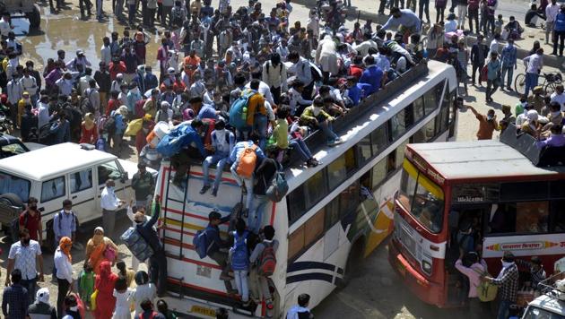 Covid-19: An aerial view of Lal Kuan bus stand where a wave of migrant workers was seen following Uttar Pradesh government’s call to arrange buses for the workers returning to their native state. (Sakib Ali/HT Photo) Covid-19: An aerial view of Lal Kuan bus stand where a wave of migrant workers was seen following Uttar Pradesh government’s call to arrange buses for the workers returning to their native state. (Sakib Ali/HT Photo)