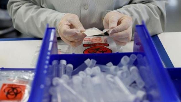 A technician assembles coronavirus test kits at Evolve manufacturing facility, where they will be manufacturing ventilators, in Fremont, California, US on March 26, 2020. (Reuters File Photo) A technician assembles coronavirus test kits at Evolve manufacturing facility, where they will be manufacturing ventilators, in Fremont, California, US on March 26, 2020. (Reuters File Photo)