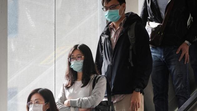 People go to work wearing protective face masks, amid coronavirus disease (COVID-19) concerns, in Taipei, Taiwan.(REUTERS)