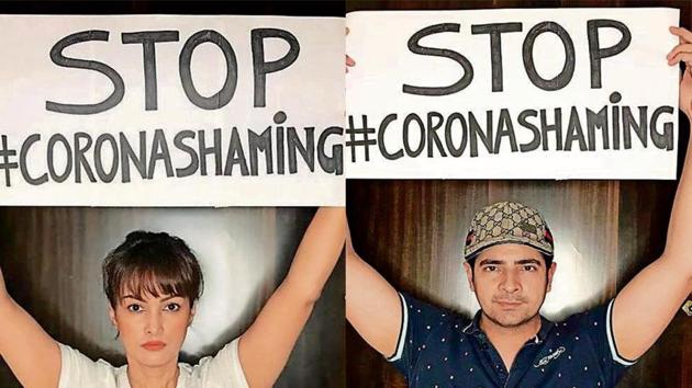 Nisha Rawal and Karan Mehra hold placards as they protest against shaming of working class. Nisha Rawal and Karan Mehra hold placards as they protest against shaming of working class.