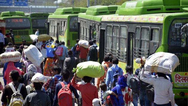 A wave of migrant workers seen at Delhi’s Anand Vihar Bus Terminus as they head to their native state on day 5 of the 21-day nationwide lockdown to curb the spread of coronavirus.(Sakib Ali/HT Photo) A wave of migrant workers seen at Delhi’s Anand Vihar Bus Terminus as they head to their native state on day 5 of the 21-day nationwide lockdown to curb the spread of coronavirus.(Sakib Ali/HT Photo)