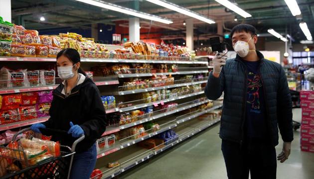 Coronavirus update: Community organizer Henry Liu films a video clip to share with a Chinatown-International District Facebook support group as he and Eliza Guan from InterIm Community Development Association buy groceries to deliver free food to seniors at Asian supermarket Uwajimaya during the coronavirus disease outbreak in Seattle, Washington, US.(Reutters File Photo/Representative Image) Coronavirus update: Community organizer Henry Liu films a video clip to share with a Chinatown-International District Facebook support group as he and Eliza Guan from InterIm Community Development Association buy groceries to deliver free food to seniors at Asian supermarket Uwajimaya during the coronavirus disease outbreak in Seattle, Washington, US.(Reutters File Photo/Representative Image)