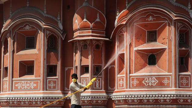 Health workers sanitize and disinfect the area near Hawa Mahal on day six of the 21 day nationwide lockdown in Jaipur. (Himanshu Vyas / HT Photo)