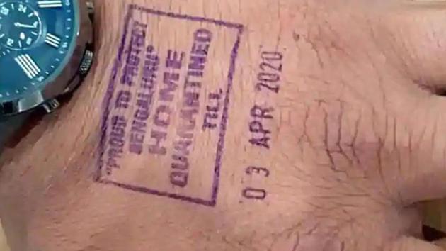 Home quarantine’ stamping with indelible ink for international passengers has started at Kempegowda International Airport in Bengaluru. The stamp indicates the last day of quarantine.(ANI File Photo) Home quarantine’ stamping with indelible ink for international passengers has started at Kempegowda International Airport in Bengaluru. The stamp indicates the last day of quarantine.(ANI File Photo)