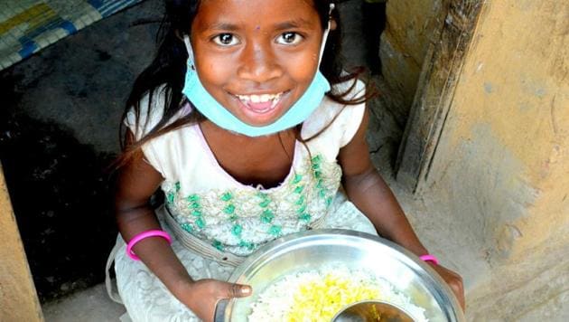 A child being fed(Photos: The Art of living foundation, Chandra Sekhar Kundu)