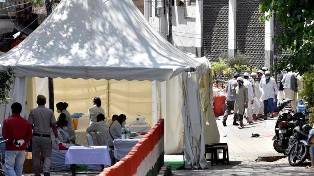 Police put up a cordon near the Nizamuddin building where a religious congregation had been held. (HT Photo/Mohd Zakir) Police put up a cordon near the Nizamuddin building where a religious congregation had been held. (HT Photo/Mohd Zakir)