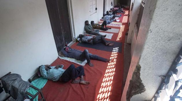 Migrant labourers stay in a shelter provided by PMC at Gogate Mahanagar Palika School, Narayan peth, on Monday. (Pratham Gokhale/HT Photo) Migrant labourers stay in a shelter provided by PMC at Gogate Mahanagar Palika School, Narayan peth, on Monday. (Pratham Gokhale/HT Photo)