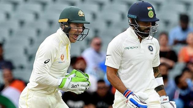 Australia's captain Tim Paine (L) celebrates as India's captain Virat Kohli leaves the field after being dismissed.(REUTERS) Australia's captain Tim Paine (L) celebrates as India's captain Virat Kohli leaves the field after being dismissed.(REUTERS)