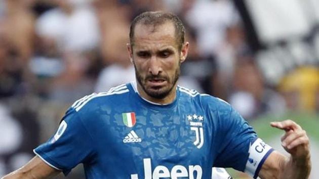 Juventus' Giorgio Chiellini, front, duels for the ball with Parma's Roberto Inglese. (AP) Juventus' Giorgio Chiellini, front, duels for the ball with Parma's Roberto Inglese. (AP)