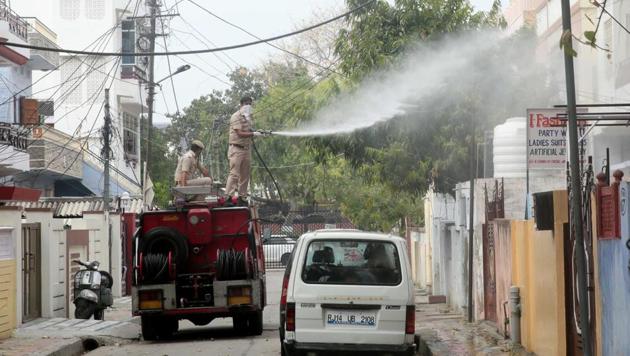 Municipal workers spray disinfectant to sanitize a locality in Jaipur as part of the drive against coronavirus. (Himanshu Vyas /HT PHOTO) Municipal workers spray disinfectant to sanitize a locality in Jaipur as part of the drive against coronavirus. (Himanshu Vyas /HT PHOTO)