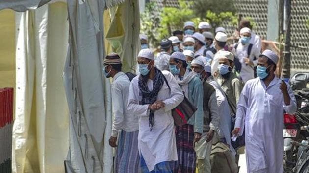 People who came for ‘Jamat’, a religious gathering at Nizamuddin Mosque, being taken to LNJP hospital for COVID-19 test, after several people showed symptoms of coronavirus, during a nationwide lockdown, in New Delhi(PTI) People who came for ‘Jamat’, a religious gathering at Nizamuddin Mosque, being taken to LNJP hospital for COVID-19 test, after several people showed symptoms of coronavirus, during a nationwide lockdown, in New Delhi(PTI)
