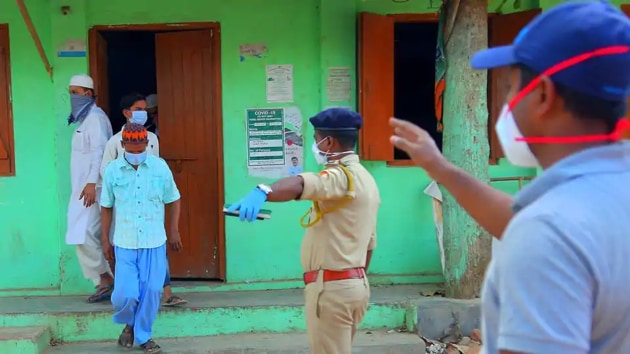 Doctors and police personnel take people to a quarantine facility amid concerns about the spread of the COVID-19 as these people directly or indirectly came in contact with people who attended Tablighi Markaz of New Delhi’s Nizamuddin, in Agartala. (ANI) Doctors and police personnel take people to a quarantine facility amid concerns about the spread of the COVID-19 as these people directly or indirectly came in contact with people who attended Tablighi Markaz of New Delhi’s Nizamuddin, in Agartala. (ANI)