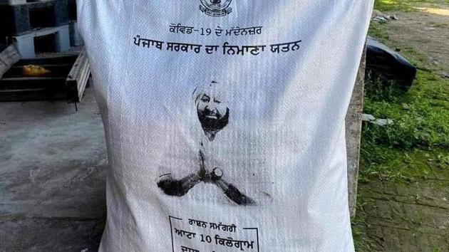 Bag with picture of CM captain Amarinder Singh is used to distribute relief material for Covid -19. (HT photo) Bag with picture of CM captain Amarinder Singh is used to distribute relief material for Covid -19. (HT photo)