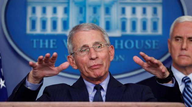 Dr. Anthony Fauci, director of the National Institute of Allergy and Infectious Diseases, addresses the daily coronavirus response briefing as Vice President Mike Pence listens at the White House in Washington, U.S., April 1, 2020. REUTERS/Tom Brenner (REUTERS) Dr. Anthony Fauci, director of the National Institute of Allergy and Infectious Diseases, addresses the daily coronavirus response briefing as Vice President Mike Pence listens at the White House in Washington, U.S., April 1, 2020. REUTERS/Tom Brenner (REUTERS)