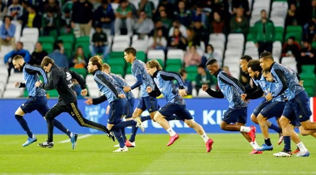 Real Madrid players during the warm up before the match. (REUTERS) Real Madrid players during the warm up before the match. (REUTERS)