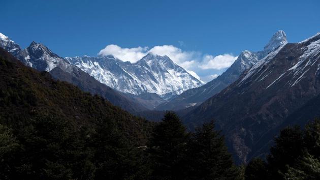 Mount Everest (centre L) and other peaks, as seen from Namche Bazaar. Tourism contributes nearly 8% of Nepal’s gross domestic product and accounts for more than a million jobs, according to the World Travel and Tourism Council. Nepal, still recovering from a major 2015 earthquake, was hoping to attract a record two million tourists in 2020. Those ambitious plans now lay shattered. (Prakash Mathema / AFP)