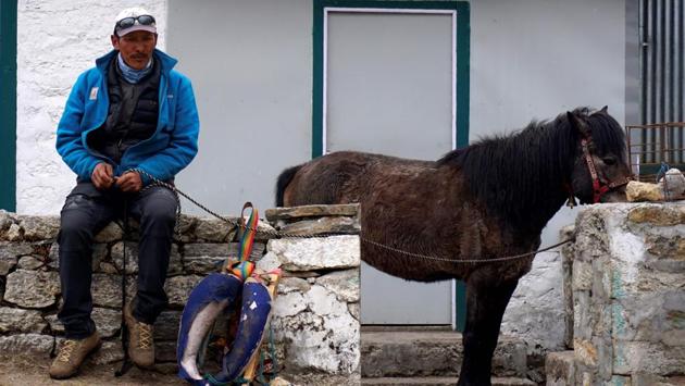 The spring season sees hundreds of foreign climbers and trekkers snake through their villages. At base camp, climbers and Nepali support staff have to live in close quarters. Renowned mountaineer Phurba Tashi Sherpa, who has climbed Everest 21 times, said that coronavirus would wreak havoc if it entered Himalayan villages. (Prakash Mathema / AFP)