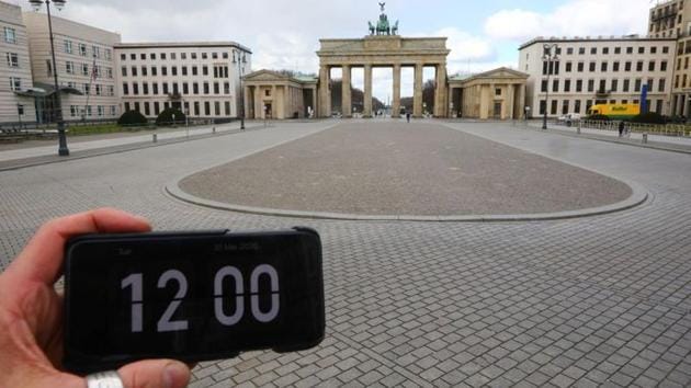 A digital clock on a smartphone is pictured in front of Brandenburg gate in Berlin, Germany. (Hannibal Hanschke / REUTERS) A digital clock on a smartphone is pictured in front of Brandenburg gate in Berlin, Germany. (Hannibal Hanschke / REUTERS)