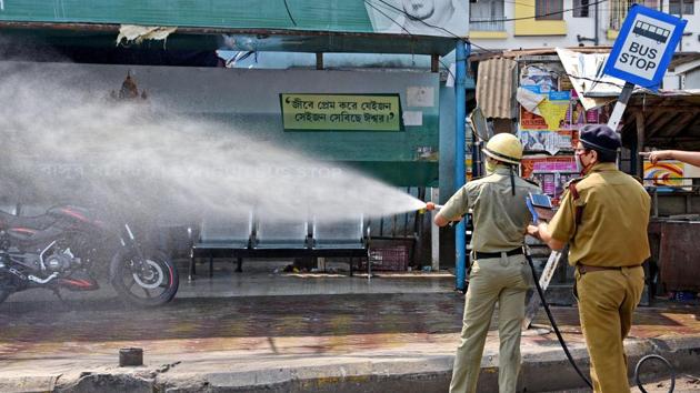 Fire fighters spray disinfectants to contain the spread of coronavirus disease Covid-19 in Kolkata on Thursday.(ANI Photo)
