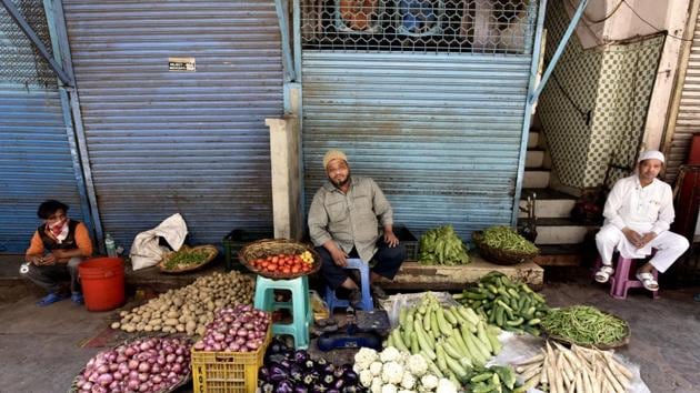 A vegetable vendor is seen at Matia Mahal on day ten of the 21 day nationwide lockdown to curb the spread of coronavirus, in New Delhi on April 3, 2020. (Sanjeev Verma/HT PHOTO) A vegetable vendor is seen at Matia Mahal on day ten of the 21 day nationwide lockdown to curb the spread of coronavirus, in New Delhi on April 3, 2020. (Sanjeev Verma/HT PHOTO)