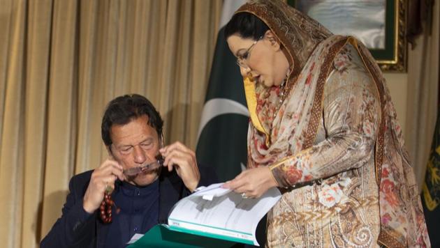 Pakistan government spokesperson Firdous Ashiq Awan consults with Pakistani Prime Minister Imran Khan in Islamabad, Pakistan, Monday, March 16, 2020. (AP) Pakistan government spokesperson Firdous Ashiq Awan consults with Pakistani Prime Minister Imran Khan in Islamabad, Pakistan, Monday, March 16, 2020. (AP)