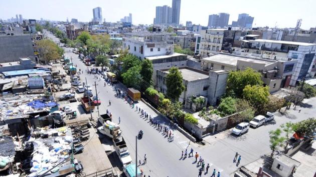 An aerial view of people queuing to collect on day nine of the 21-day nationwide lockdown to check the spread of coronavirus, near Sector 5, in Noida on Thursday, April 02, 2020. (Photo by Sunil Ghosh / Hindustan Times) An aerial view of people queuing to collect on day nine of the 21-day nationwide lockdown to check the spread of coronavirus, near Sector 5, in Noida on Thursday, April 02, 2020. (Photo by Sunil Ghosh / Hindustan Times)