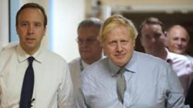 UK’s Health Secretary Matt Hancock, who had been self-isolating after his COVID-19 diagnosis last week, returned to the frontline to address the daily Downing Street briefing on Thursday (AP) UK’s Health Secretary Matt Hancock, who had been self-isolating after his COVID-19 diagnosis last week, returned to the frontline to address the daily Downing Street briefing on Thursday (AP)