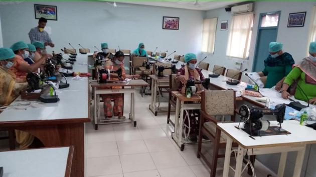 Making masks on their sewing machines at homes and community centre, wives of Rupnagar cops are doing their bit to ensure safety and health of people. (HT PHOTO) Making masks on their sewing machines at homes and community centre, wives of Rupnagar cops are doing their bit to ensure safety and health of people. (HT PHOTO)