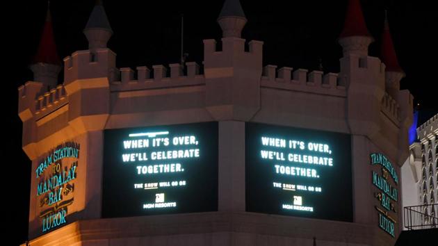 Signs at the shuttered Excalibur Hotel & Casino on the Las Vegas Strip display a hopeful message as a result of the statewide shutdown due to the continuing spread of the coronavirus across the United States on April 2, 2020.(AFP) Signs at the shuttered Excalibur Hotel & Casino on the Las Vegas Strip display a hopeful message as a result of the statewide shutdown due to the continuing spread of the coronavirus across the United States on April 2, 2020.(AFP)