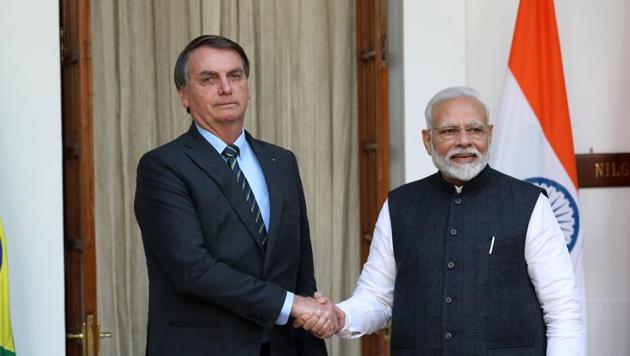 PM Narendra Modi shakes hands with Jair Bolsonaro, Brazil's president, at Hyderabad House in New Delhi during the latter’s visit to India in January, 2020. The two leaders spoke to each other on telephone on the Covid-19 situation on April 4, 2020. (Bloomberg File) PM Narendra Modi shakes hands with Jair Bolsonaro, Brazil's president, at Hyderabad House in New Delhi during the latter’s visit to India in January, 2020. The two leaders spoke to each other on telephone on the Covid-19 situation on April 4, 2020. (Bloomberg File)