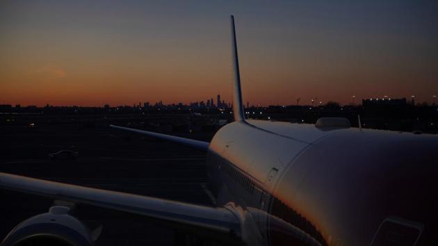 A plane is pictured before take off at JFK airport as Reuters photographer Nora Savosnick travels back. "It's very strange not being able to see friends and to only live with my mum and my dad at the age of twenty-four. And, it's just a huge contrast from my life from New York as well. Oh, God, it's just two different worlds," Savosnick said. (Nora Savosnick / REUTERS) A plane is pictured before take off at JFK airport as Reuters photographer Nora Savosnick travels back. "It's very strange not being able to see friends and to only live with my mum and my dad at the age of twenty-four. And, it's just a huge contrast from my life from New York as well. Oh, God, it's just two different worlds," Savosnick said. (Nora Savosnick / REUTERS)