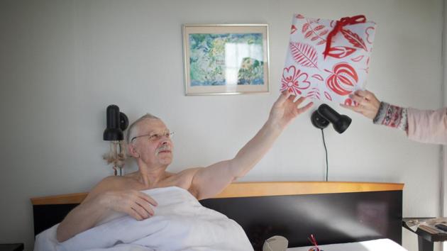 Mats Haraldsson sits in bed as he receives presents on his birthday. The family looked for the blessings in this time no one had wanted or expected. “There have been many plagues in the history of humanity, and we have always continued in one way or another,” Mats said. “Maybe it will put us back to enjoy today because we don’t know so much about tomorrow.” (Nora Savosnick / REUTERS) Mats Haraldsson sits in bed as he receives presents on his birthday. The family looked for the blessings in this time no one had wanted or expected. “There have been many plagues in the history of humanity, and we have always continued in one way or another,” Mats said. “Maybe it will put us back to enjoy today because we don’t know so much about tomorrow.” (Nora Savosnick / REUTERS)