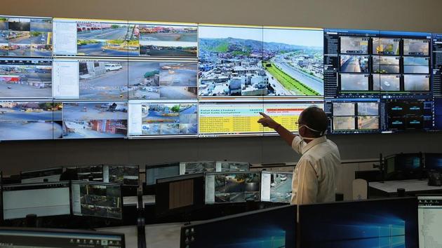 An official examines the giant live screens at the ‘corona war room’ in police commissioner’s office in Jaipur on Saturday.(Himanshu Vyas/HT Photo) An official examines the giant live screens at the ‘corona war room’ in police commissioner’s office in Jaipur on Saturday.(Himanshu Vyas/HT Photo)