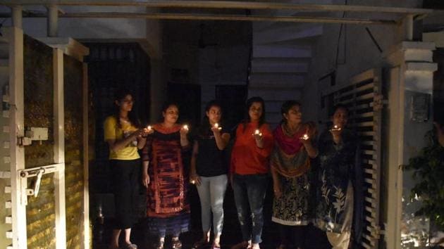 Image shows people taking part in #9pm9minute initiative. (HT Photo/Sameer Sehgal) Image shows people taking part in #9pm9minute initiative. (HT Photo/Sameer Sehgal)