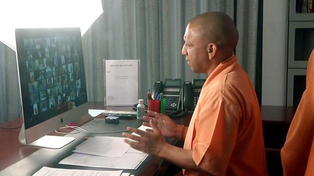 Uttar Pradesh CM Yogi Adityanath interacts with district officials on COVID-19 arrangements through video conferencing (ANI) Uttar Pradesh CM Yogi Adityanath interacts with district officials on COVID-19 arrangements through video conferencing (ANI)