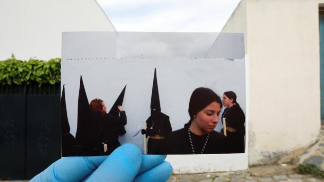 A picture of penitents of the “Santo Entierro” brotherhood made in March 2018, in front of the street of the procession, on April 5, 2020. Spaniards now find themselves in the fourth week living under one of Europe’s strictest lockdowns. (Jon Nazca / REUTERS) A picture of penitents of the “Santo Entierro” brotherhood made in March 2018, in front of the street of the procession, on April 5, 2020. Spaniards now find themselves in the fourth week living under one of Europe’s strictest lockdowns. (Jon Nazca / REUTERS)