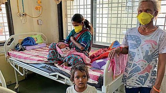 Ranabai with her family at Kamla Nehru Hospital.