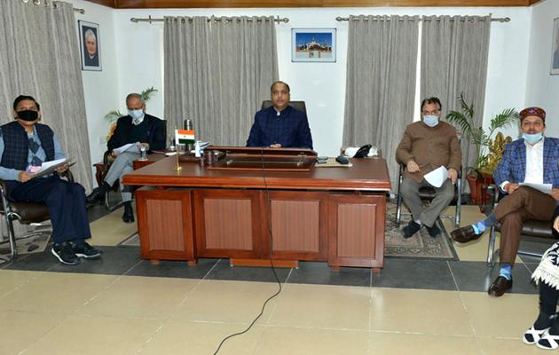 Chief minister Jai Ram Thakur presiding over the cabinet meeting through video conferencing at his official residence on Tuesday. (HT Photo) Chief minister Jai Ram Thakur presiding over the cabinet meeting through video conferencing at his official residence on Tuesday. (HT Photo)