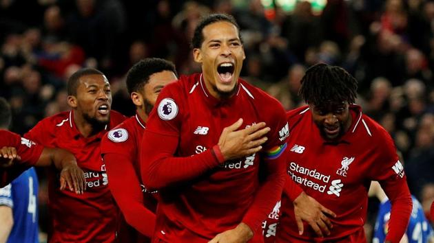 Liverpool's Divock Origi celebrates scoring their first goal with Virgil van Dijk and team mates.(REUTERS)